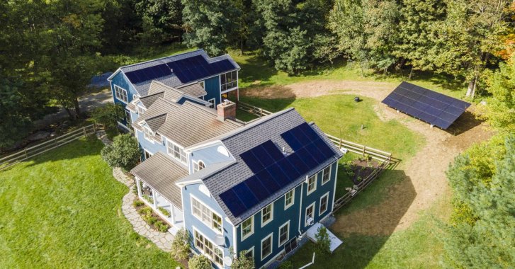 Residential roof mount and ground mount solar panel system in Vermont.