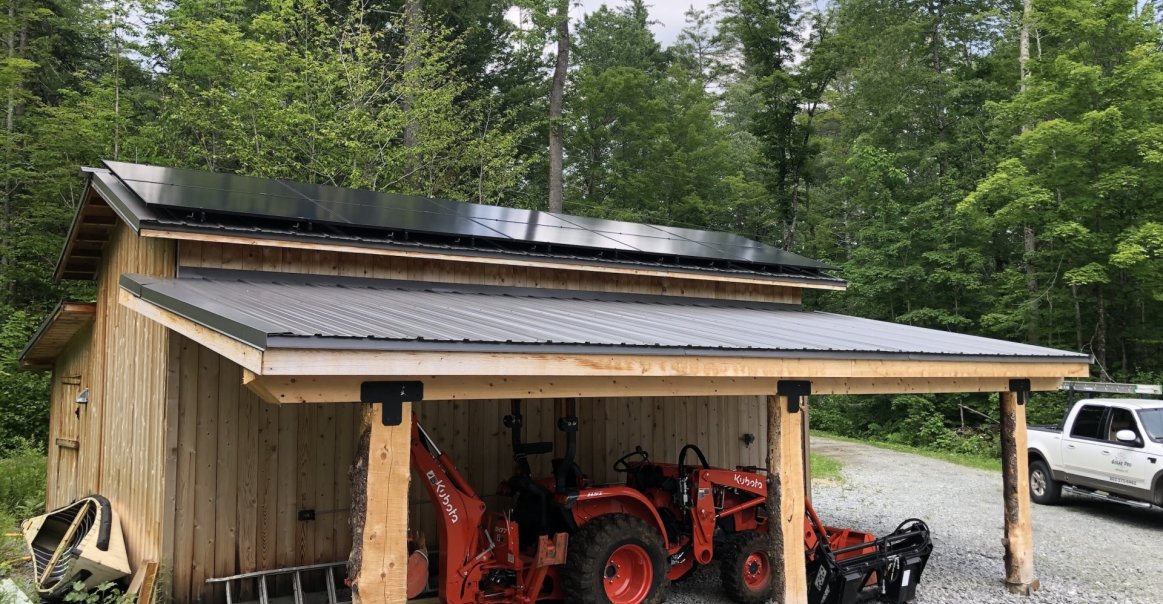 Garage view of roof mount solar panel installation.