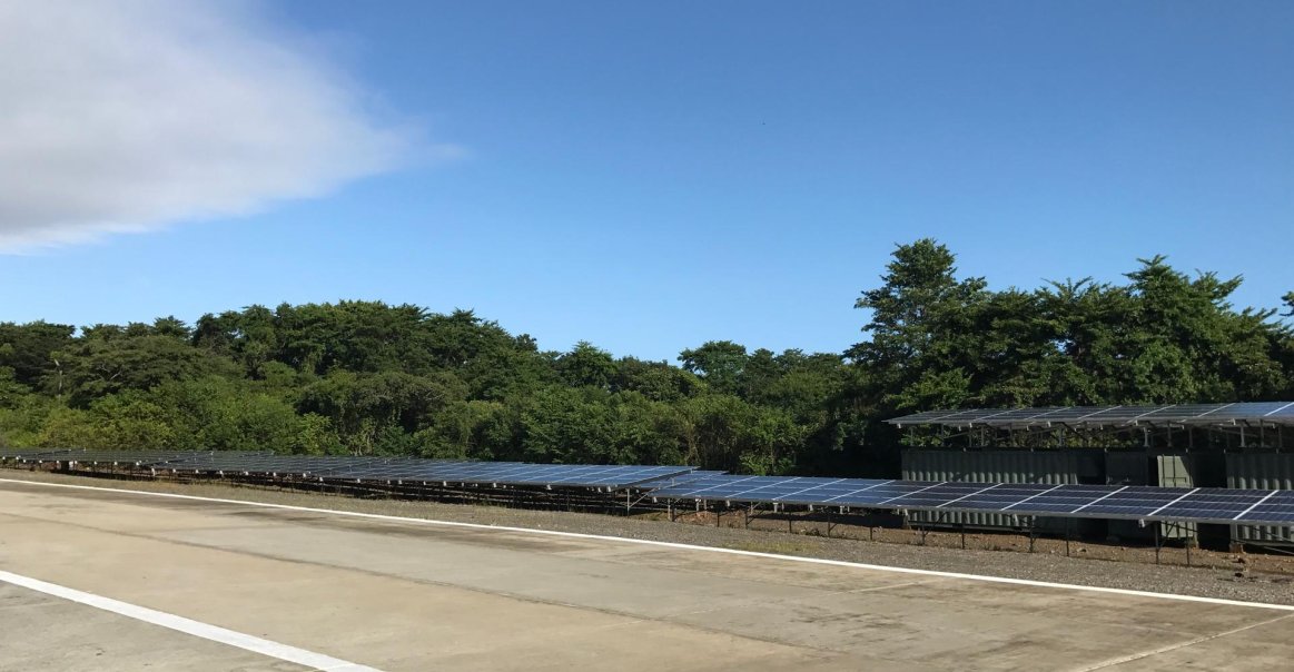 Solar Array nicely blended in to the jungle airstrip Solar blended in to the jungle airstrip
