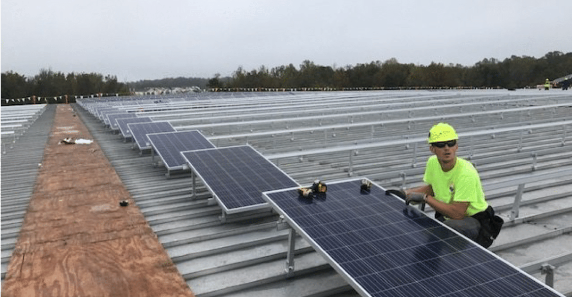 Solar Installer with Photovoltaic Modules
