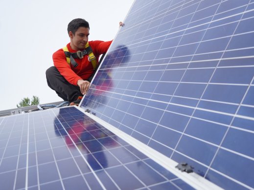 Volunteer with Solar Panel