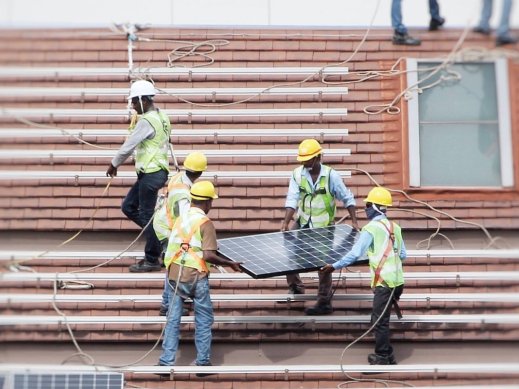 Solar Installers on Roof Header